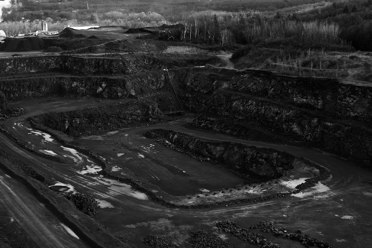 mining road grayscale photography